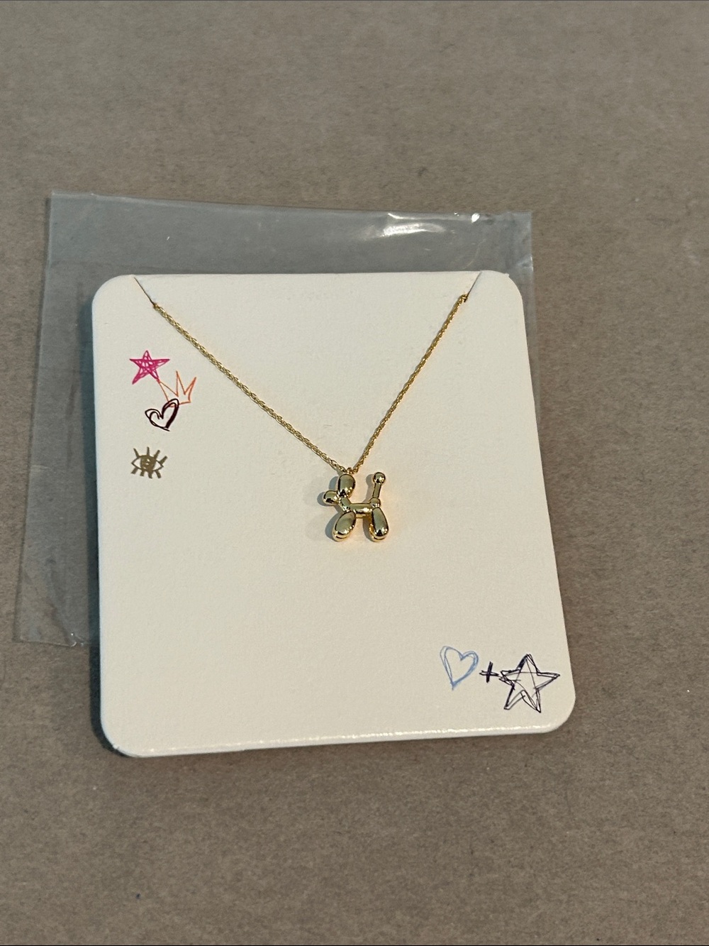 Francesca's Collections Gold Balloon Dog Pendant Necklace